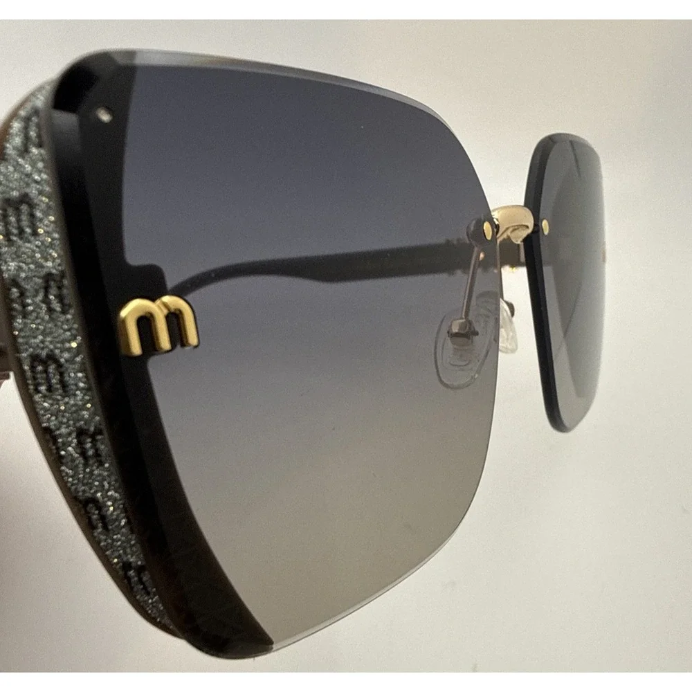 Miu Miu Aube Authentic Womens Sunglasses Black frameless Gold trim Gradient Lens